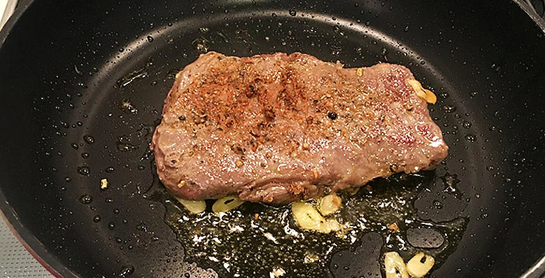 Steak on a frying pan